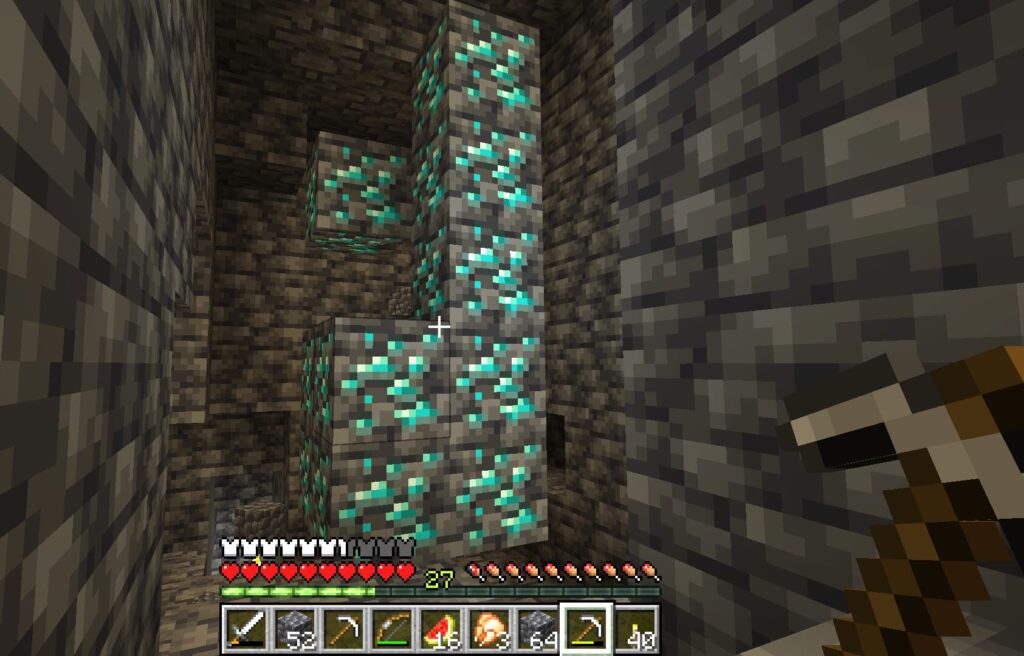 a screenshot of an unusually large, natural vein of diamond ore in Minecraft